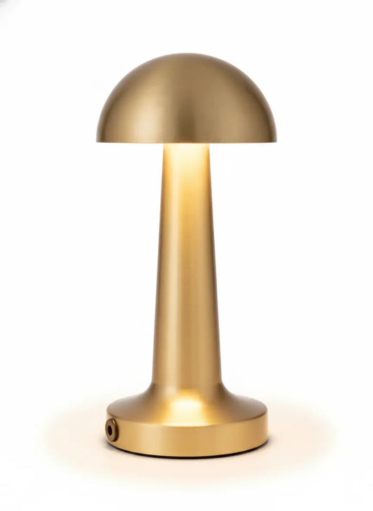 Lampe champignon dorée design sur fond blanc, éclairage LED rechargeable au style moderne et élégant.