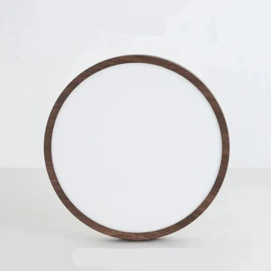 Vue du dessous d’un luminaire bois rond LED