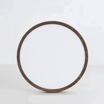Vue du dessous d’un luminaire bois rond LED