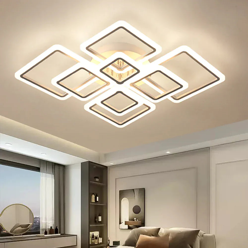 Luminaire LED pour salon avec carrés lumineux – installation plafonnier dans un salon moderne.