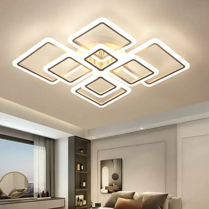 Luminaire LED pour salon avec carrés lumineux – installation plafonnier dans un salon moderne.