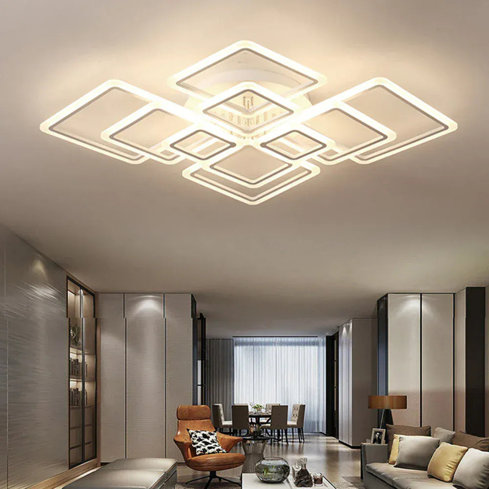 Luminaire LED géométrique suspendu au plafond du salon – design carré élégant.