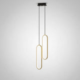 Suspension lumineuse design double ovale dorée, luminaire moderne pour salon ou chambre.